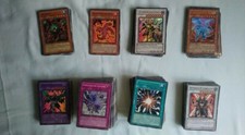 LOTTO YU-GI-OH CON CARTE, BUSTINE, ALBUM, TERRENO DI GIOCO