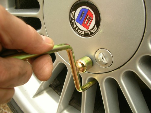 Strumento coprimozzo ruota bmw - coprimozzo,