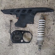 STOCK GILERA ARIZONA RX 125 AMMORTIZZATORE CONTACHILOMETRI PROTEZIONE CATENA 