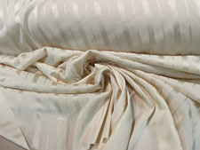 TESSUTO IN JERSEY LUCIDO