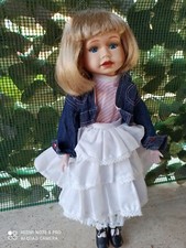 Bambola in porcellana da