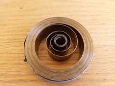 MOLLA DI RICAMBIO PER GRAMMOFONO OROLOGIO  25x85mm ATTACCO CENTRALE CON ASOLA