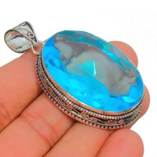 Ciondolo gioiello taglio ovale argento sterling 925 fatto a mano pietra preziosa topazio blu svizzero