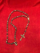 Rosario in metallo argentato con grani di vetro sfaccettato