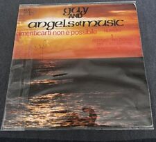 Guy and angels of music: 45 giri "Dimenticarti non è possibile/Love me"