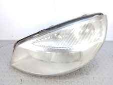 10569 Faro fanale proiettore ant sx Renault Scenic del 2005 II serie cod 7701064
