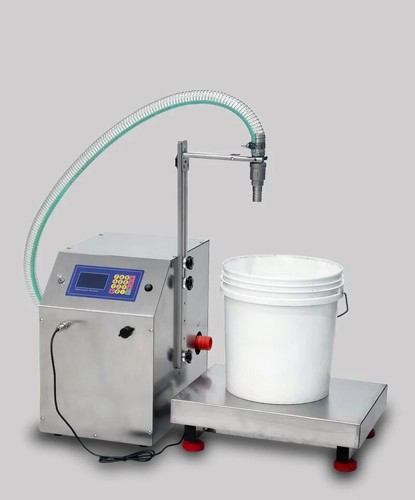 Pesatrice riempitrice ad - pesatrice, e