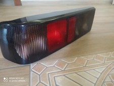 vendo coppia fari posteriori ford sierra color fumè usati ma come nuovi 