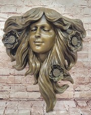 Scultura da parete donna