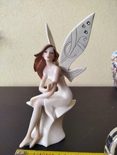 FAIRY HADAS ELFEN FEES FATA FATINA BIANCA SEDUTA NO LES ALPES