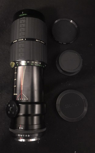 Sigma zoom lens - sigma, f