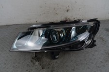 102388 Faro Anteriore SX Saab