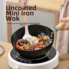 Wok in ferro battuto stile