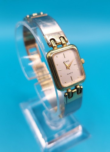 Vintage dumai swiss quartz - swiss,