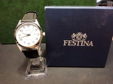 FESTINA, al quarzo, funzionante, 40 mm., con confezione e come nuovo.