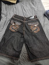Pantaloncini neri polo sud