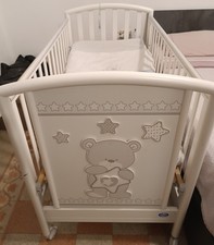 Lettino con sponde regolabili in altezza e fasciatoio PALI in ottime condizioni 