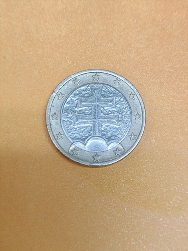 Moneta euro doppia croce - moneta,
