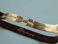 Cartier bracciale con chiusura deployante in oro 18 kt.