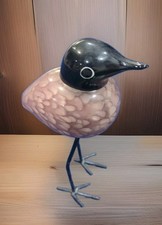 Statuina uccellino viola in