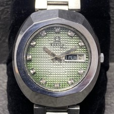 Raro orologio TITUS Matic quadrante verde testurizzato data giorno del 1990...