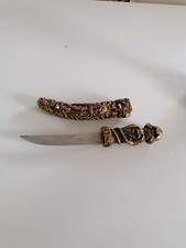 Pugnale mano di scheletro dorato estraibile da collezione oggetto soprammobile