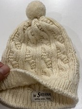 Capellino  Con  Pon pon E Trecce Neonato