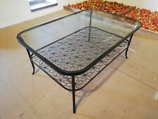 Tavolino in vetro e ferro verniciato nero con piano floreale. Misure 116x78 H51