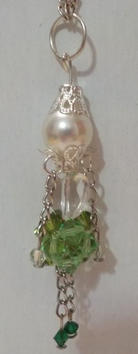 Collana con bambolina verde