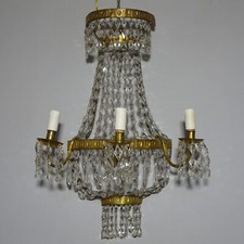 Antiche  applique in metallo dorato e gocce di cristallo molato Periodo Impero