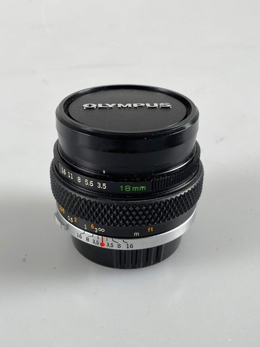 Olympus system zuiko auto w - om-system,