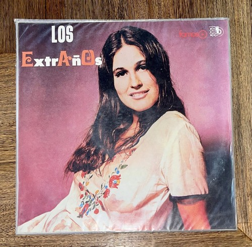 Los extraños tumba la - -,