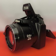 Nikon COOLPIX P90 fotocamera digitale compatta nera 12,1 MP 24x zoom testata