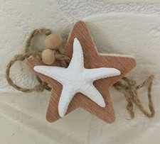 Stella in legno naturale con