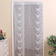 Tende in pizzo bianco ricamate