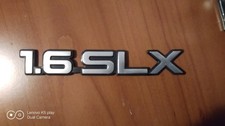 NISSAN PRIMERA 16 SLX LOGO