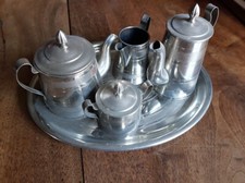 giocattoli antichi in metallo