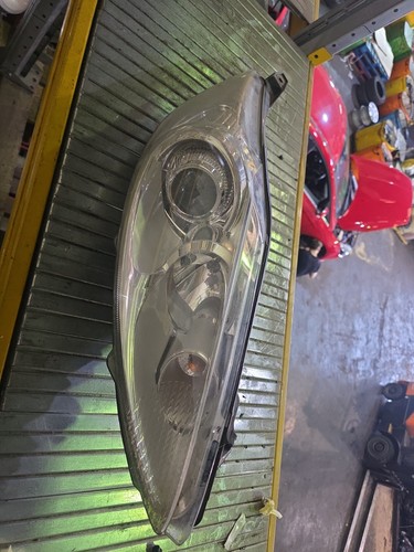 Faro proiettore anteriore lato