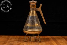 Caraffa e scalda caffè in