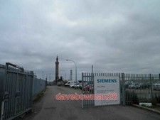 PHOTO  GATES TO SIEMENS SITE OFFICE GRIMSBY DOCKS NORTH WALL OFFSHORE WIND TURBI