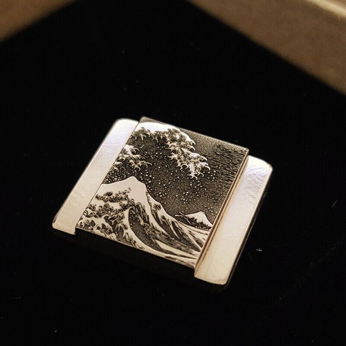 Kanagawa pulsante otturatore