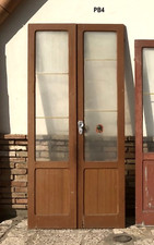 Antica porta finestra vetrata bugnata vetrina a due ante in legno massello