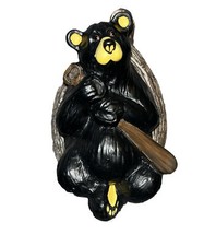 Statuina trota arcobaleno orso