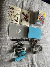 Nintendo Wii azzurra usata + giochi + cavi + telecomandi + adesivi e istruzioni