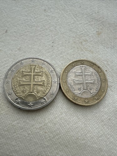 Moneda euros 1 - 2, +