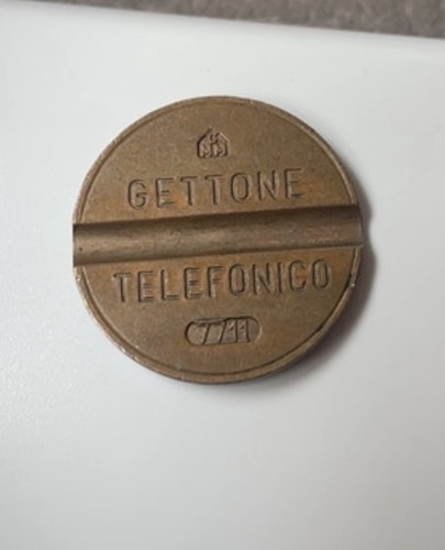 Gettone telefonico 7711 - telefonico,
