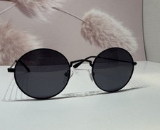 Occhiali da sole rotondi