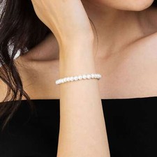 Bracciale con perle bianche