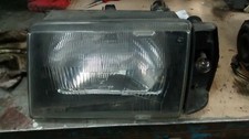 Faro anteriore sinistro Lancia Prisma 1987 per modello con tergifari Carello