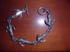 MASSICCIO BRACCIALE CON